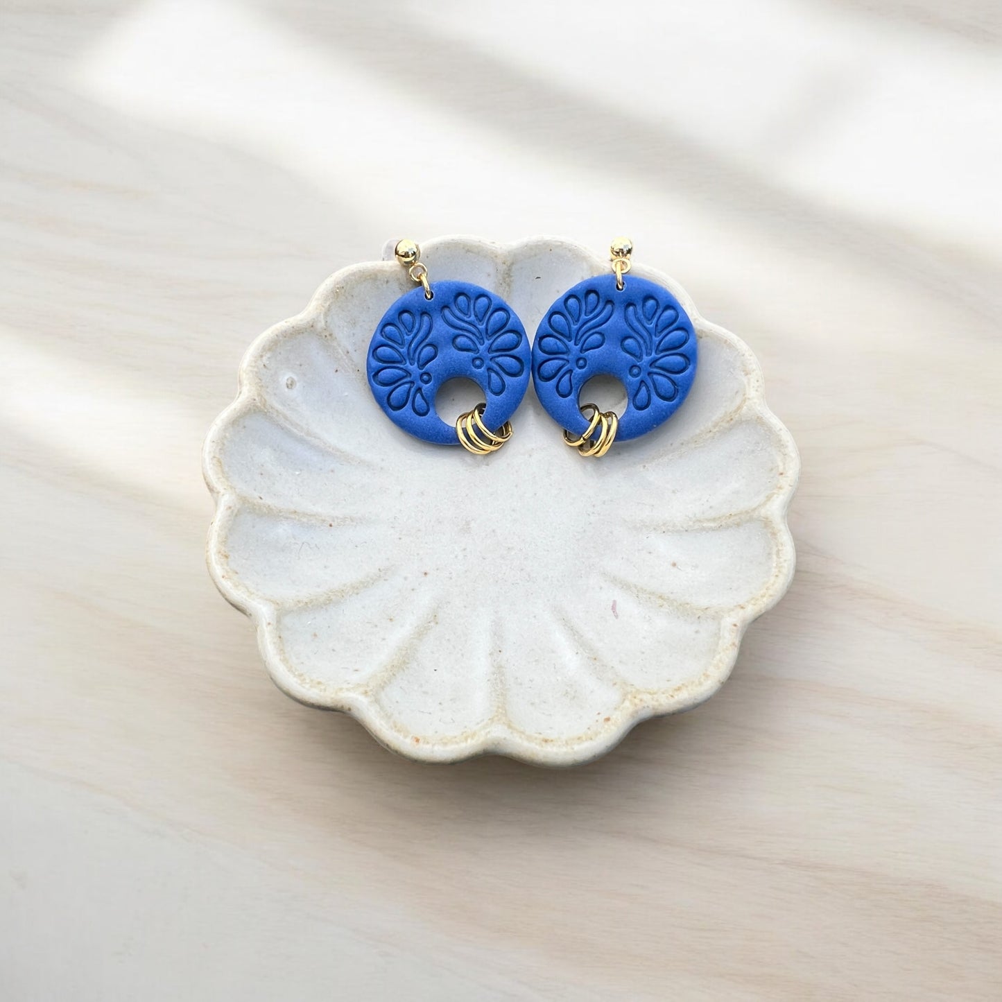 Blue Round Swivel Dangles with Gold Accents